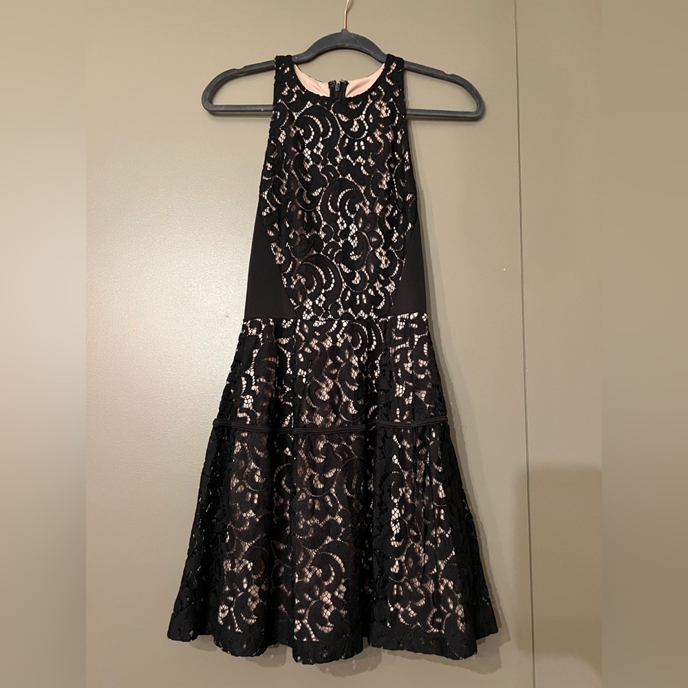 Black lace over nude dress